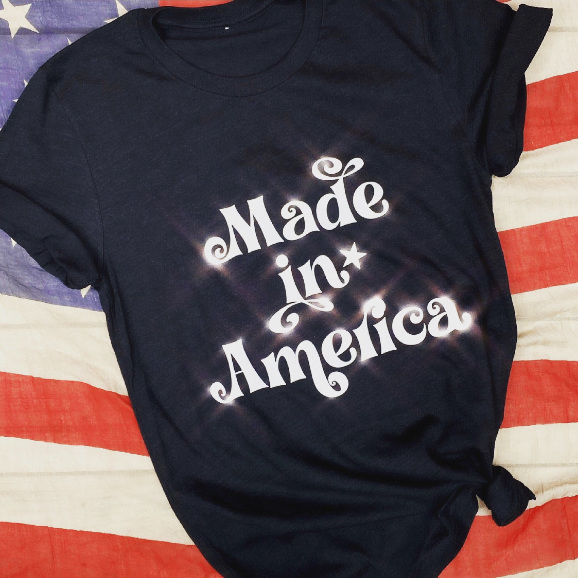 "MADE IN AMERICA" BELLA CANVAS BLACK TOP  WITH  WHITE GLITTER WORDING decoration